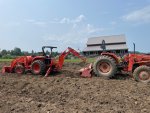 L2501 backhoe to lift rotiller back on M6800.jpg