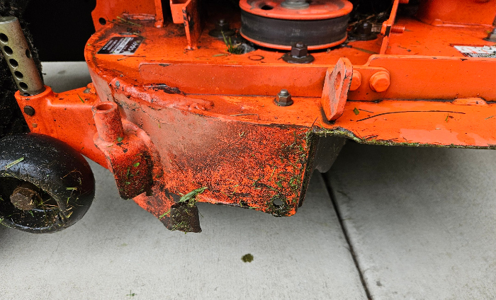 25 06 27 Kubota mower deck damage by chute small.jpg