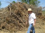 4 acre, burn pile with trash, me.jpg