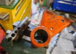 25 08 21 kubota mower anti scalp wheel support off mower next to removed shaft small.jpg